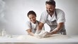 A happy young couple is having fun kneading dough in the kitchen. 