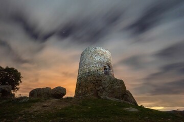 Sticker - Important watchtower and viewpoint in the area of Cotos de Monterrey with the sky in long exposure.