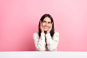 Wall Mural - Photo of cheerful dreamy lady wear white cardigan arms cheeks looking empty space isolated pink color background