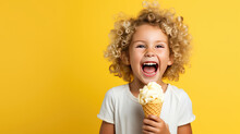 Cheerful happy child girl hold sweet ice cream in hands, eat ice-cream on flat yellow background with copy space. 