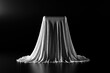 Mysterious square object covered by white cloth. 3d illustration of secret object over black background