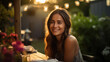 © MP Studio - Smiling woman sits at a table during an outdoor evening party in a home's backyard