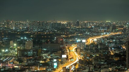 Wall Mural - Bangkok city skyline night timelapse at city center and street highway, Thailand 4K time lapse