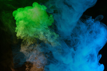 Green and pink steam on a black background.