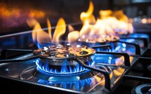 Kitchen Gas Cooker With A Big Blue Propane Gas Flame. Generative AI
