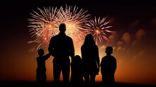 Silhouette Of A Family Against A Background Of Fireworks