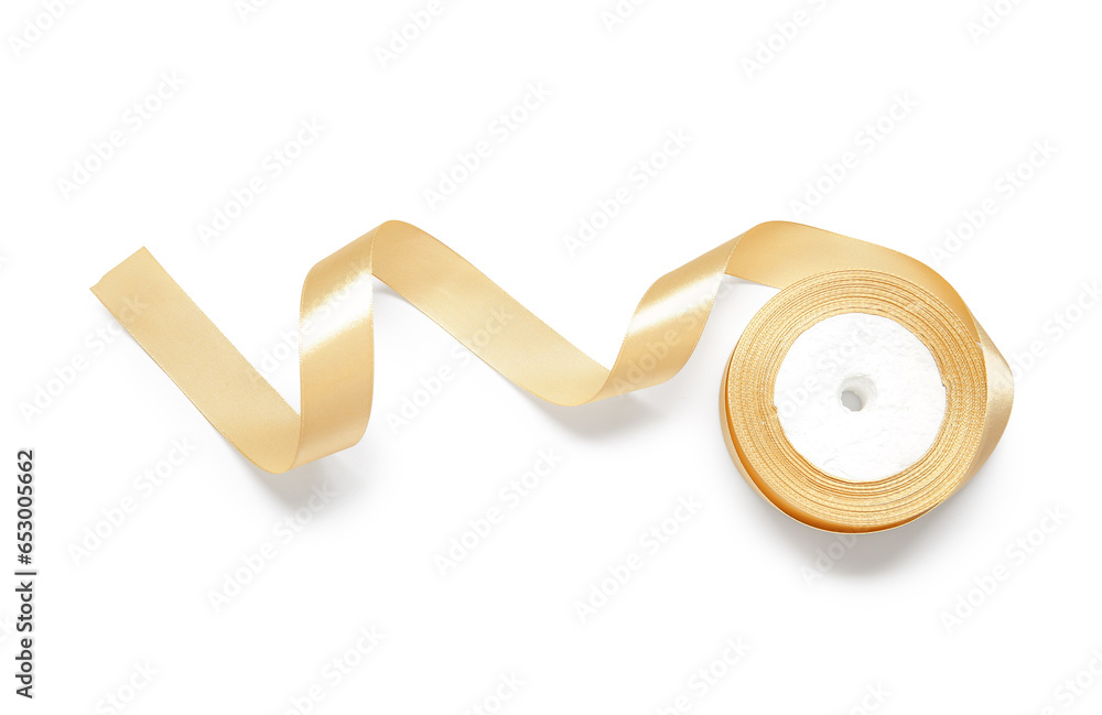 Bobbin of golden ribbon isolated on white background