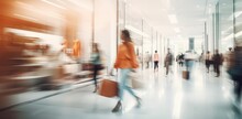 Blurred Background Of A Modern Shopping Mall With Some Shoppers. Shoppers Walking At Shopping Center, Motion Blur. Abstract Motion Blurred Shoppers With Shopping Bags, Ai