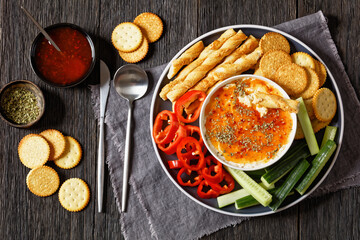 Wall Mural - Hot Pepper Jelly Cheese Dip with crackers, veggies