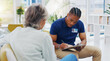 © Wesley JvR/peopleimages.com - Retirement, documents and a nurse talking to an old woman patient about healthcare in an assisted living facility. Medical, planning and communication with a black man consulting a senior in her home