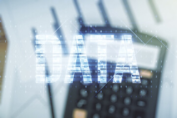 Wall Mural - virtual data word sign hologram on calculator background. multiexposure