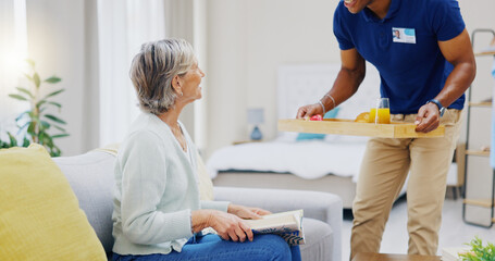 Wall Mural - Breakfast, assisted living and retirement with a mature woman on a sofa in the living room of her home. Morning, food and a nurse black man serving a meal to an elderly patient in a care facility