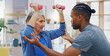 © Wesley JvR/peopleimages.com - Physiotherapy, black man and senior woman stretching, smile and consultation in office, help and wellness. Physiotherapist, male employee and happy female client stretch, health and rehabilitation