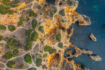 Wall Mural - Ponta da Piedade, Algarve, Portugal. Natural beach and cliffs. Aerial drone view