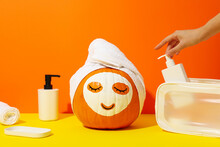 Pumpkin With Face Mask And Skin Care Products