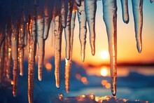 Icicles In Cold Winter Landscape At Sunset