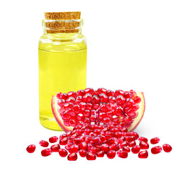 Wall Mural - pomegranate seed oil in bottle isolated on white background