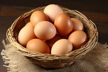 Organic Brown Eggs In A Wicker Basket