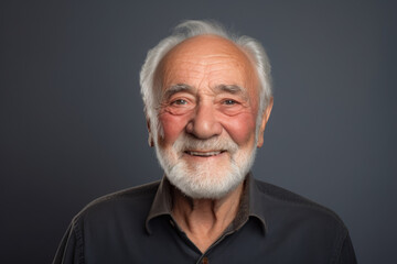 Canvas Print - A picture of a man with a white beard wearing a black shirt. This versatile image can be used to represent various concepts and themes.