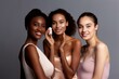 © VERTEX SPACE - Beauty portrait of a diverse group of beautiful women posing together against a light grey studio background.