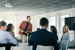 © Johnér - Group of business people attending presentation during conference