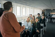 © Johnér - Group of business people attending presentation during conference
