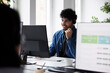 © Johnér - Smiling young man working in call center