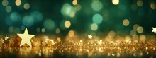 New Years Christmas Gold Green Star Background Web Banner With Copy Space. Christmas Teal Green And Golden Abstract Glitter Bokeh Background. Selective Focus