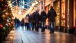 © Meow Creations - Blurred people walking on the street at Christmas time.
