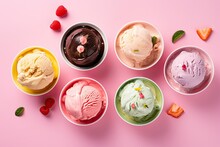 Colorful ice cream with different flavors in cups isolated on pink background