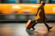 Man with a suitcase hurrying up in international airport. Person carrying luggage running in a hurry in train station. Motion blur.