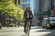 Cycling commuter. A young American man riding a bicycle on a road in a city street. Blurry city street on background.