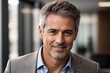 © kapros76 - Headshot close up portrait of latin confident mature good looking middle age leader on blur office background. Generative Ai.
