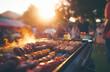 A barbecue full of food in the garden of a house, at sunset, the joy of sharing a BBQ with friends at sunset, enjoying friendship in company.