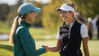 Two women shake hands before a round of golf