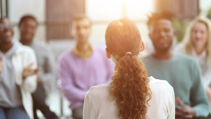 Wall Mural - young business woman giving a presentation in a conference room. Back view