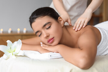 Wall Mural - Beautiful woman receiving spa massage in salon