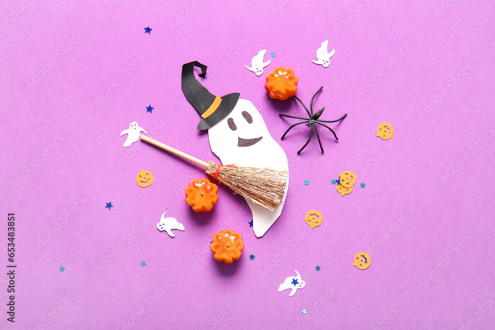 Halloween composition with ghost, broom and pumpkins on purple background