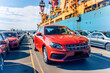 © EKH-Pictures - Global business logistics import export of cars. Cargo ship loading in port. Transport industry concept