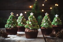 Christmas Cupcakes Decorated With Green Frosting And Christmas Tree.