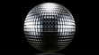 Silver disco ball on black background