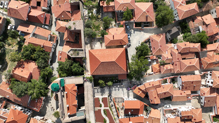 Sticker - A photo taken with a drone of traditional Turkish houses inside Ankara Castle.