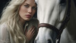 Beautiful albino blonde woman with curly hair and horse