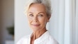 A dignified senior model woman's close-up portrait radiating wisdom and poise, face skin care beauty