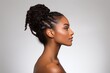 © Anastasiia - Portrait Showcases Beautiful African American Woman With Long, Curly Braids And Bun Her Flawless Face Structure, Complete With Sharp Jawline, Is Emphasized As She Gazes To