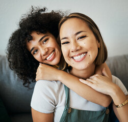 Poster - Lesbian, couple and portrait of hug on sofa in home, living room or apartment with love, support and happiness. Lgbt, women or relax together on couch with pride, confidence smile in embrace in house