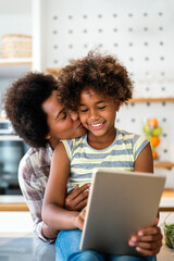 Wall Mural - Caring african american mother hugging teenage daughter, enjoy moment of love, motherhood concept