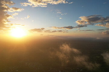 Wall Mural - sunset over landscape aerial view