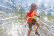 © travelview - children have fun in the Zorbing Ball