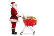 © Ljupco Smokovski - Full length profile shot of Santa Claus standing with a shopping cart tied with a red ribbon